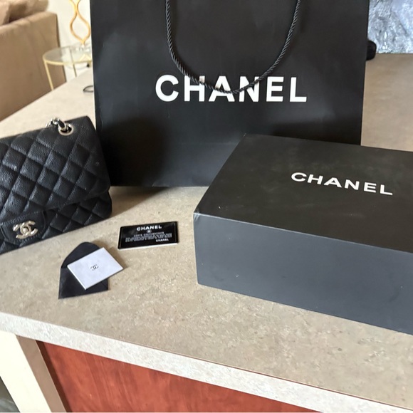 CHANEL Handbags - CHANEL Quilted Black Bag with Silver Accents